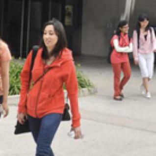 Students walking on campus in summer