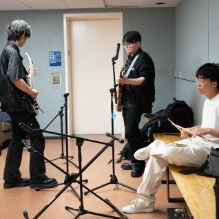 students rehearsing in the green room