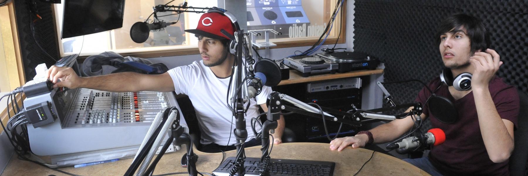 students in campus radio station