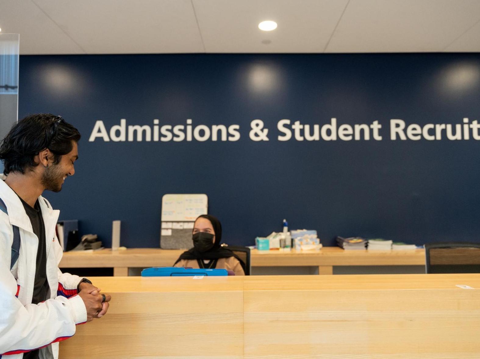 Student at Admissions & Student Recruitment front desk