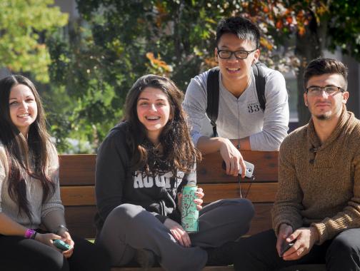 Students sitting on bench