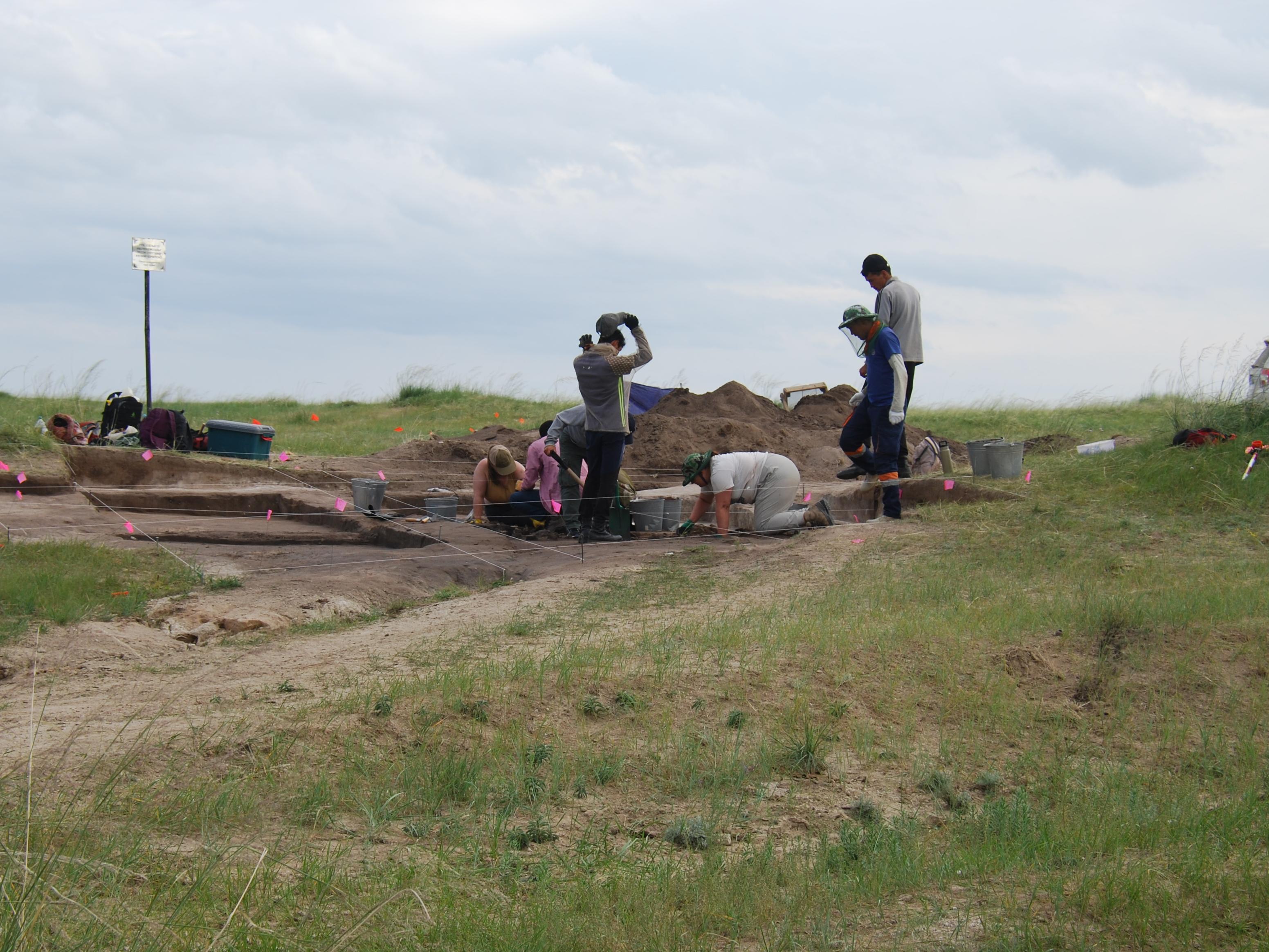 Archaeologists digging on the Mongolian Steppe