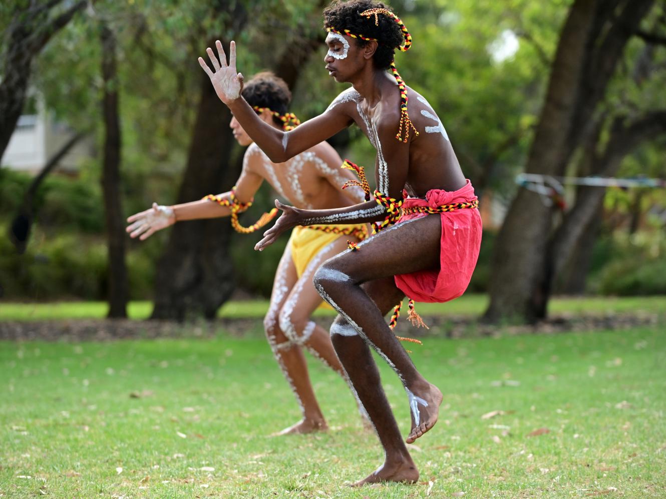 Aboriginal Australians demonstrating traditional dance