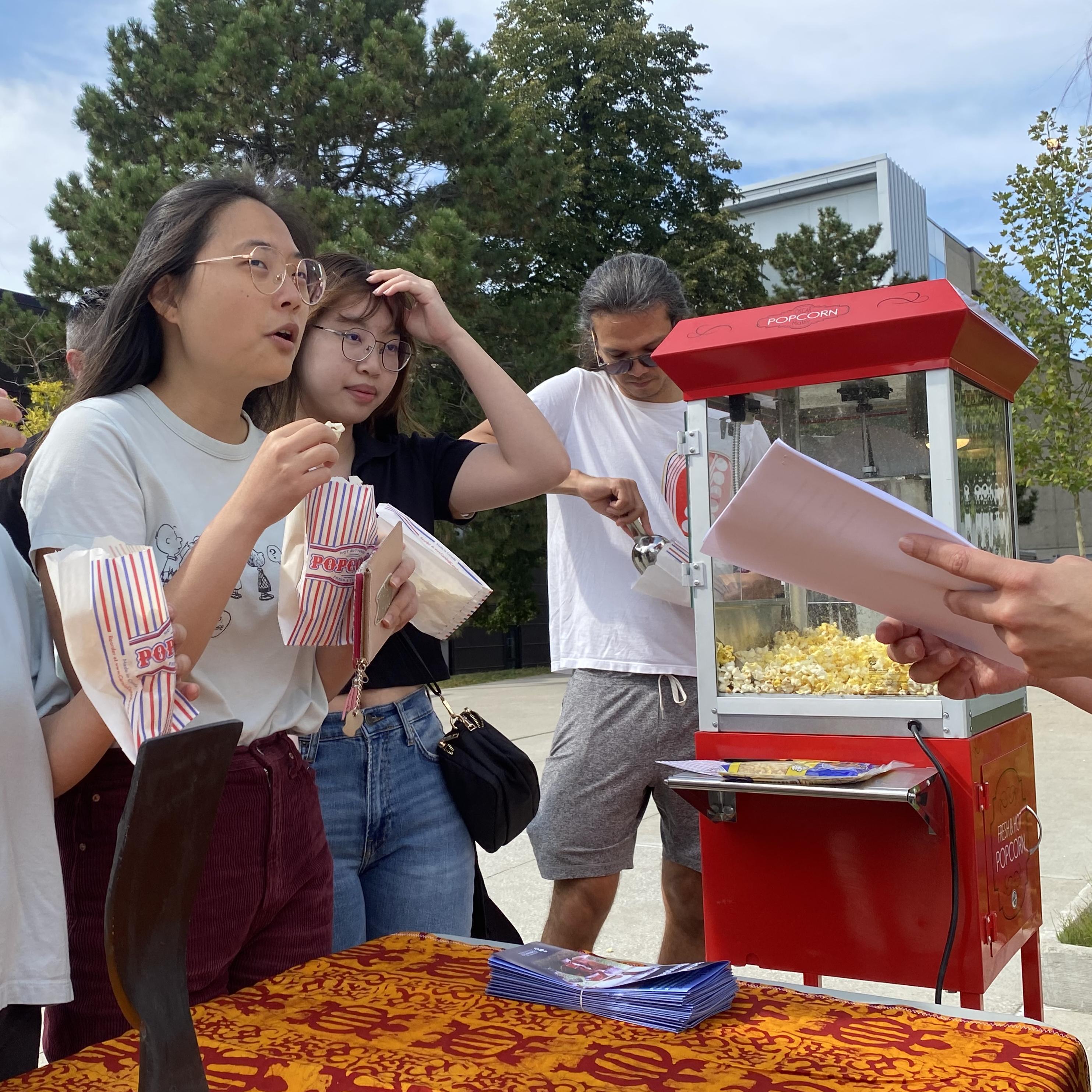 Students sampling some free popcorn