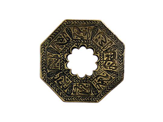 Octagonal talisman with meandrous middle circle. The writing is on one side, saying a Duaa (prayer) citing 8 names of God cited in the holy Quran