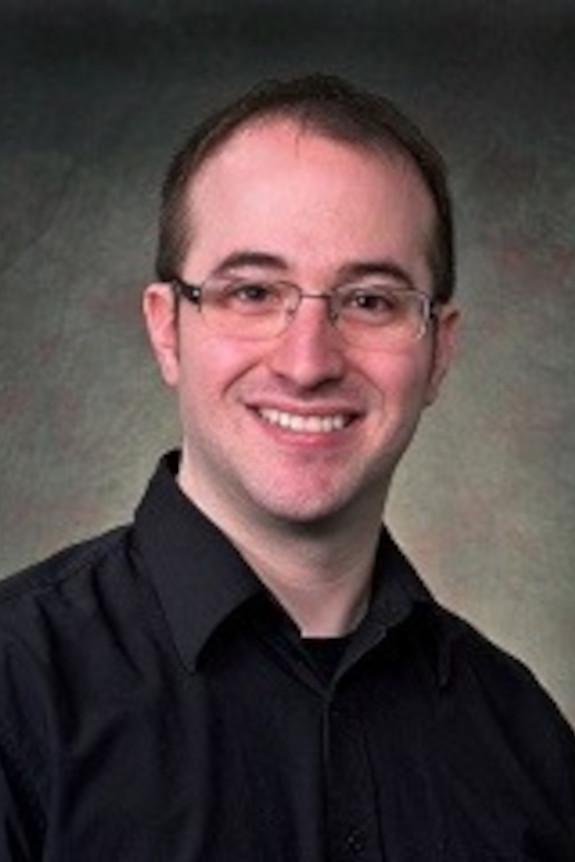A photo of professor Michael Cavers.