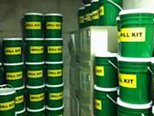 Spill kits in a storage room