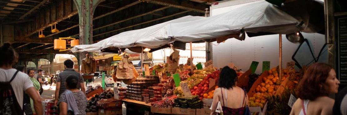 produce market under subway line Queens New York