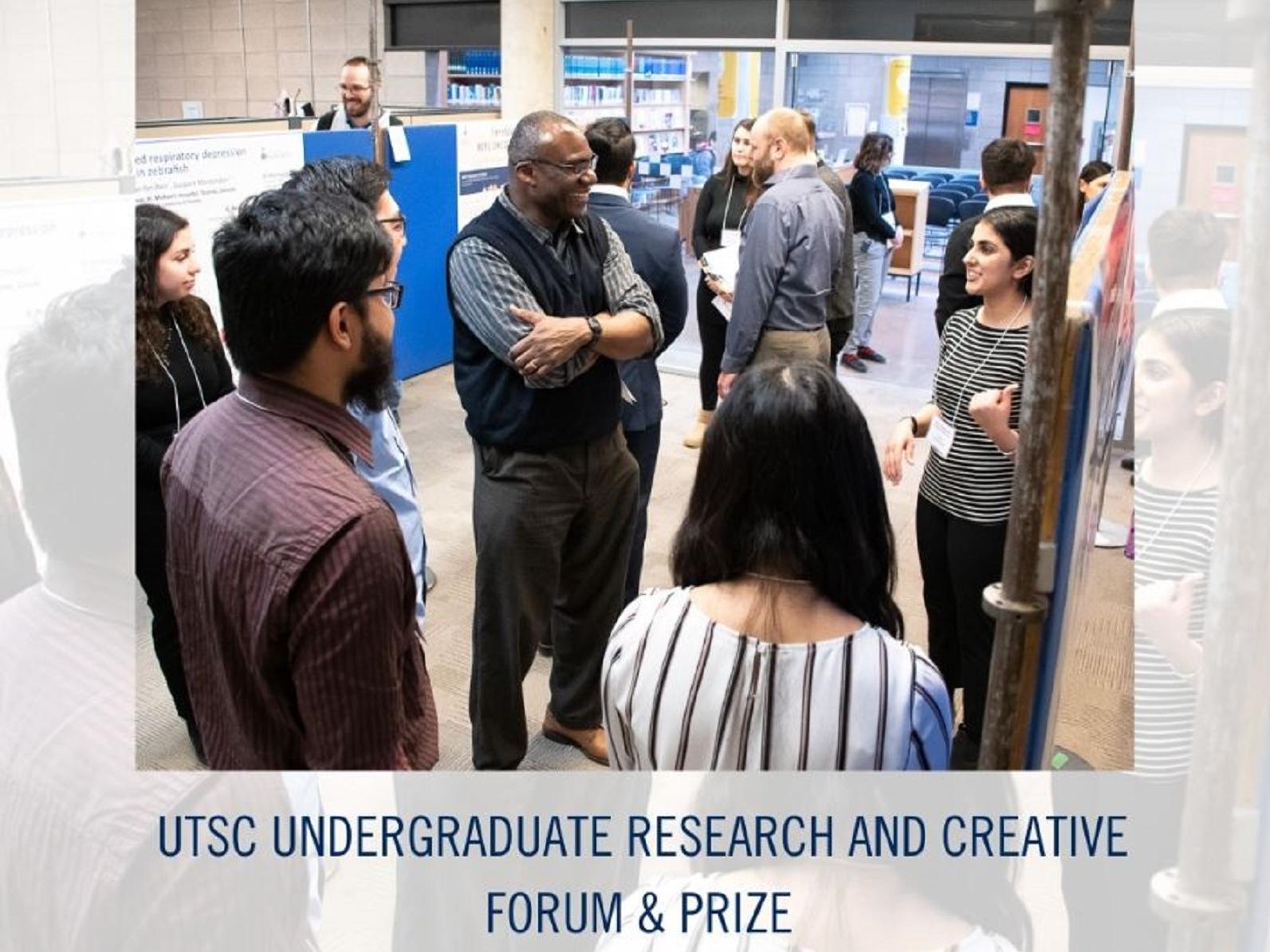 Image of student discussing their research poster with attendees at the UTSC Undergraduate Research and Creative Forum