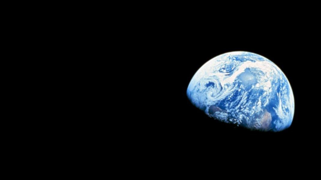 Partial view of the earth from a dark sky. 