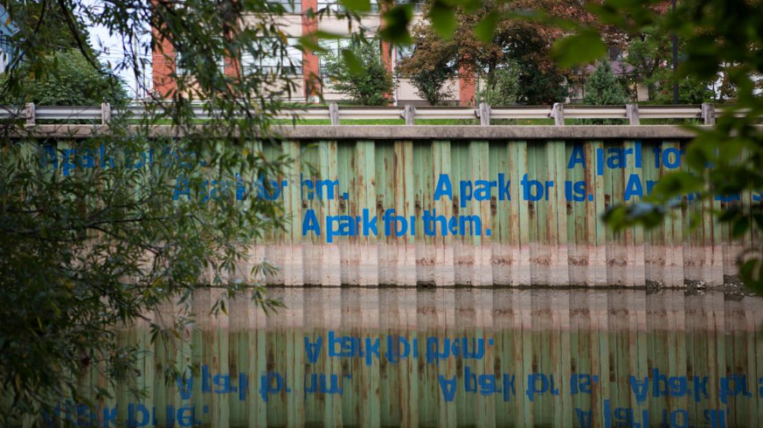 An image of Will Kwan&#039;s art installation, &quot;A Park for All&quot; along the industrial retaining walls of the Don River.