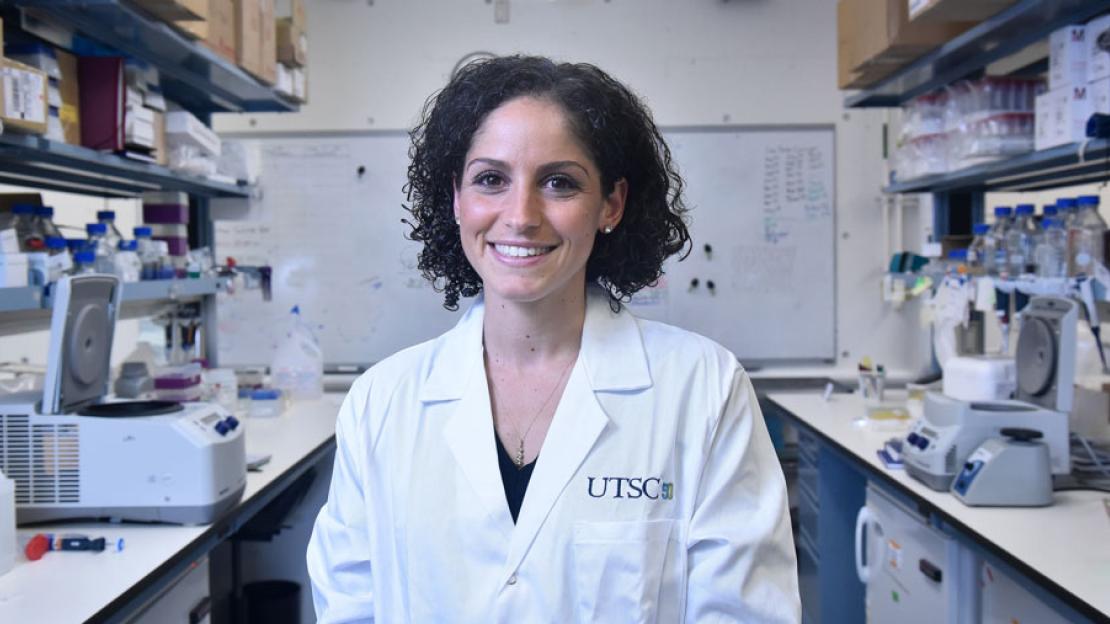 Assistant Professor Christina Guzzo in a neighbouring lab while hers is under construction