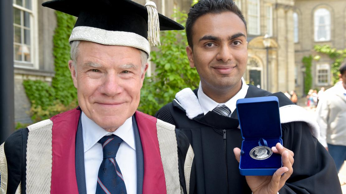 Milhil Patel with former U of T Scarborough principal Bruce Kidd at the 2016 Convocation ceremony.