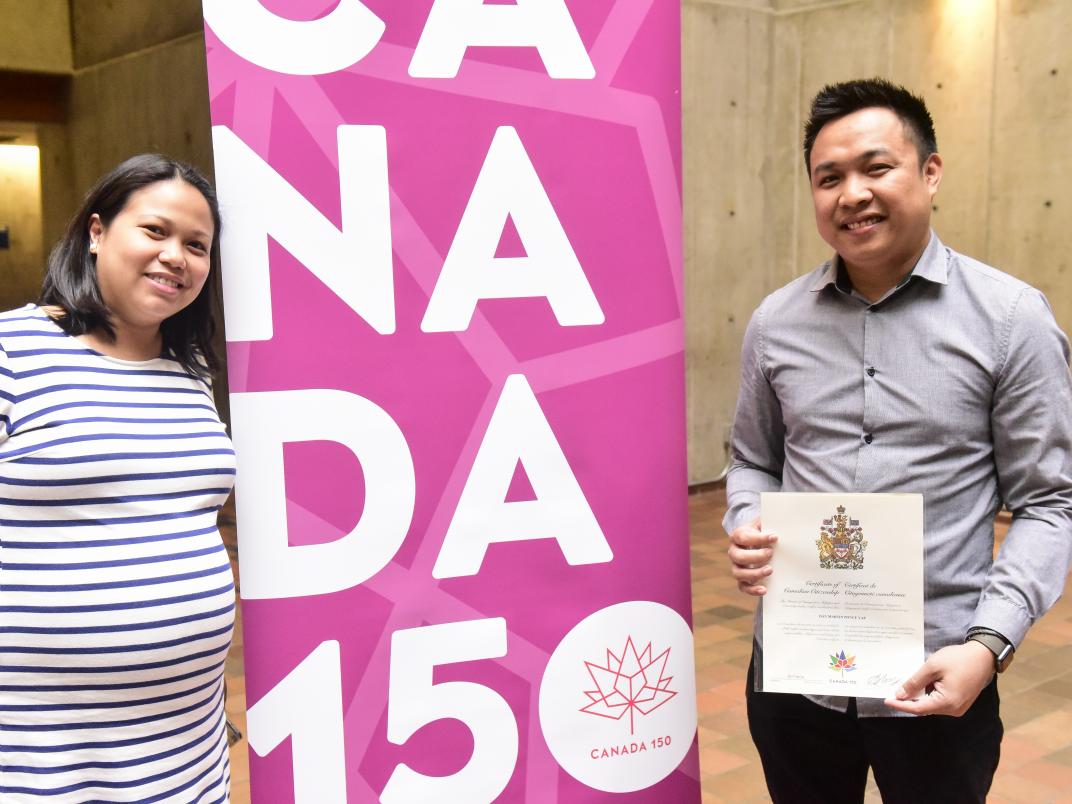 Julie and David Yan smile at U of T Scarborough&#039;s citizenship ceremony.