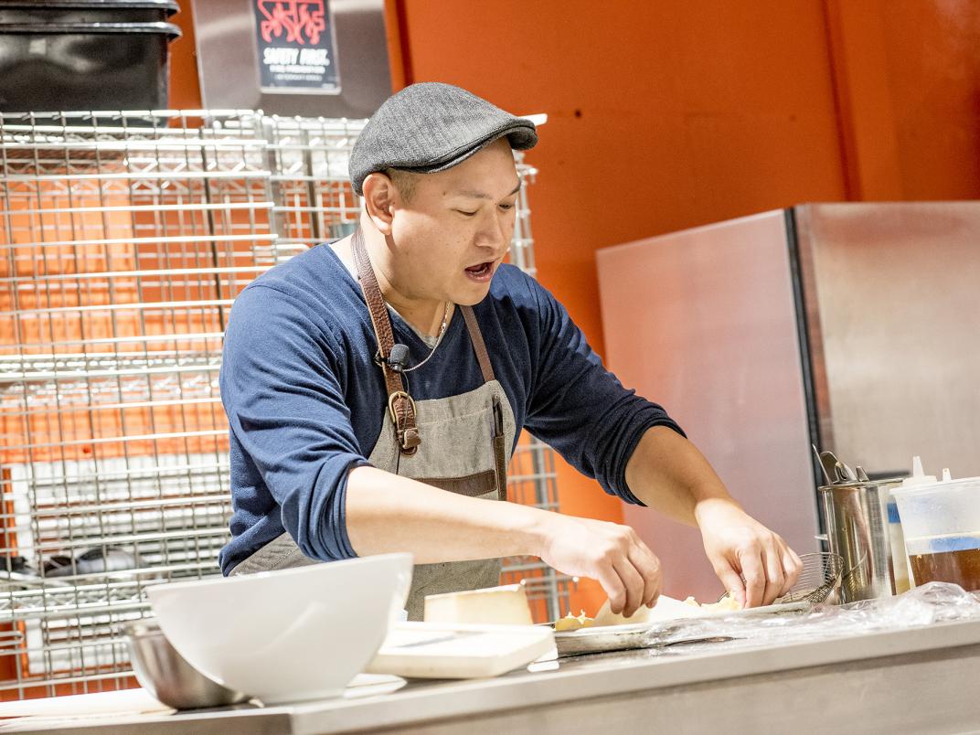 Toronto Chef Nick Liu preparing a dish for Chinese Food Everywhere Day 2.