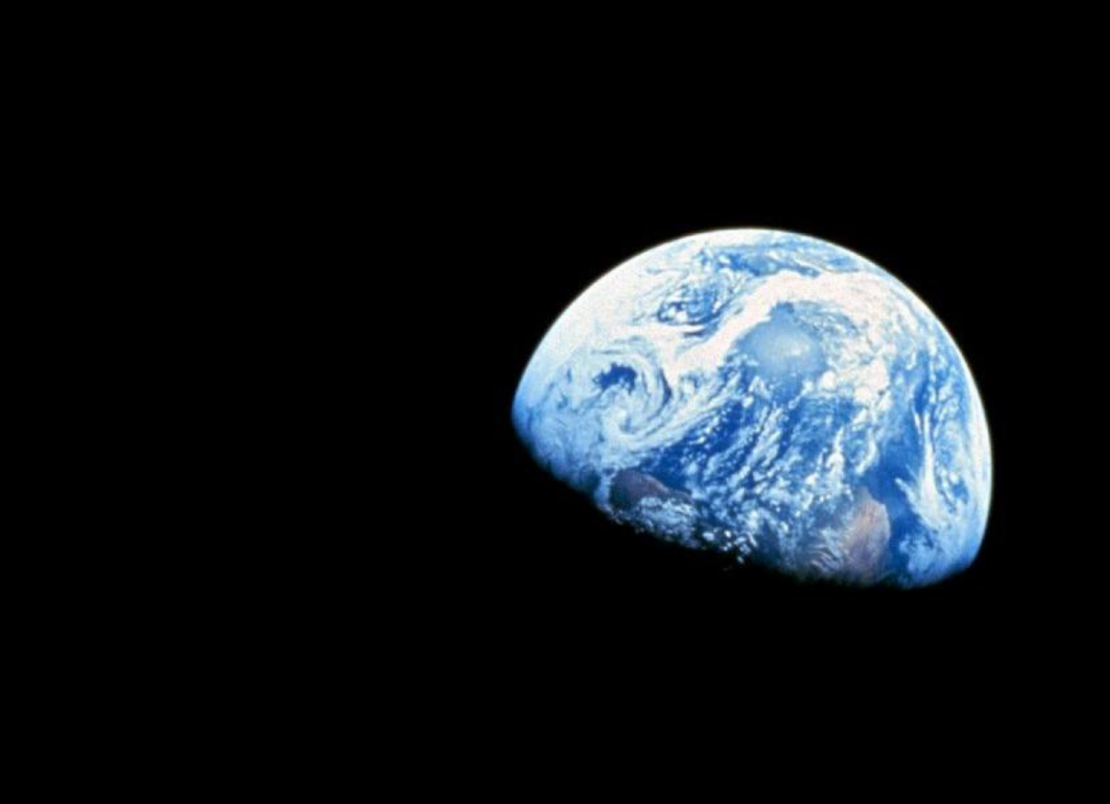 Partial view of the earth from a dark sky. 