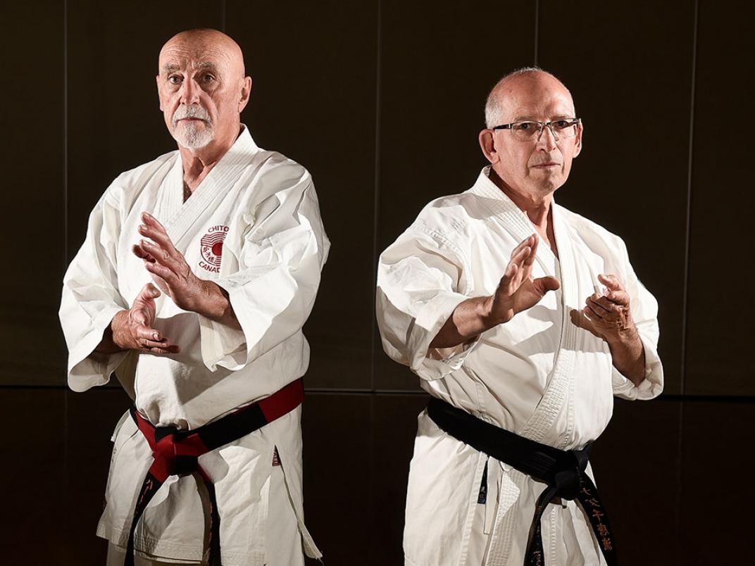 Two karate instructors posing.