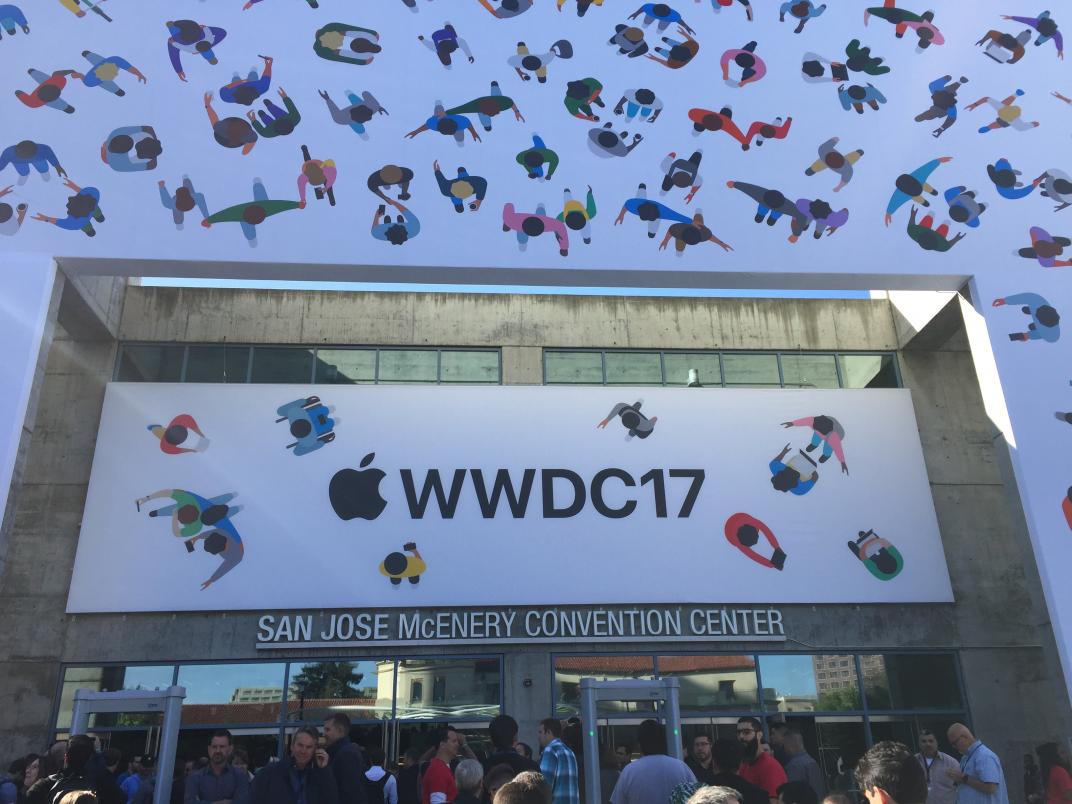 The front entrance to the San Jose Convention Center in San Jose, California, United States, during the 2017 Apple Worldwide Developers Conference. The Lin Utzon tile mural adorning the entrance has been wrapped in WWDC brand artwork. (Photo by Minh Nguyen)