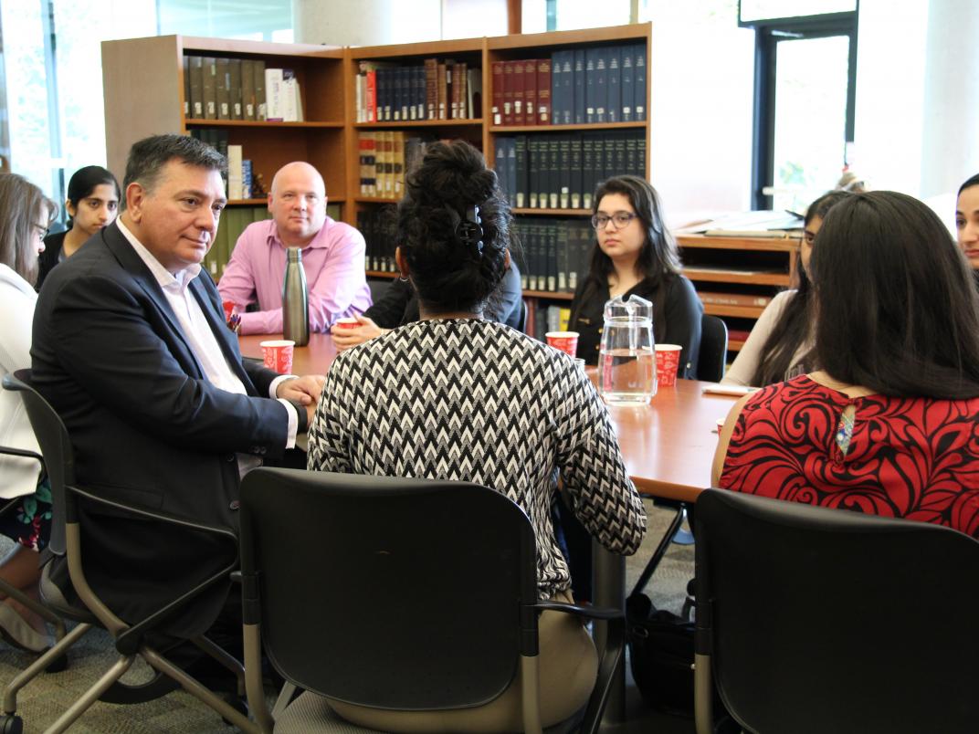 Ontario Finance Minister Charles Sousa meets with eight University of Toronto Mississauga students Friday to discuss the revamping of OSAP (photo by Blake Eligh)