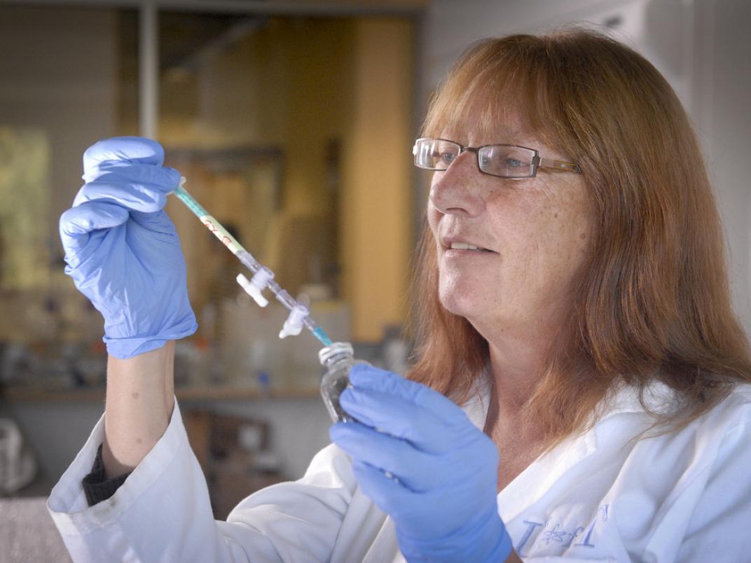Roberta Fulthorpe conducting research in a lab,