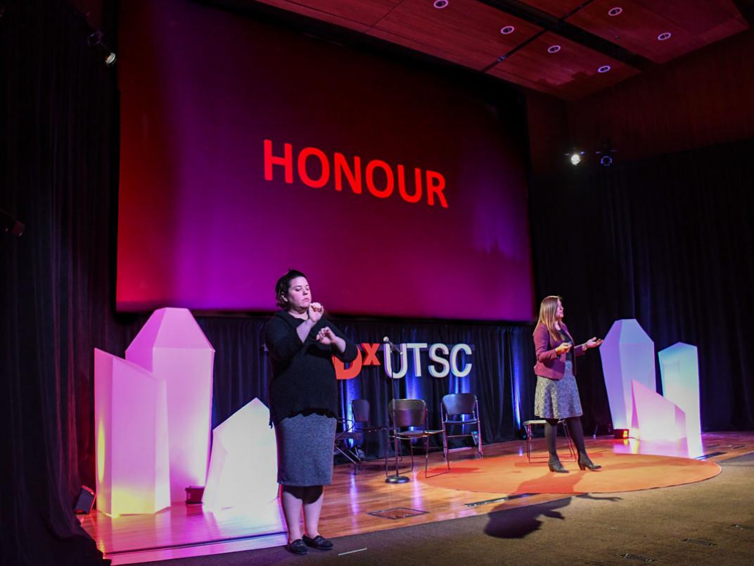 Samra Zafar delivering her TEDxUTSC 2018 presentation on women&#039;s honour