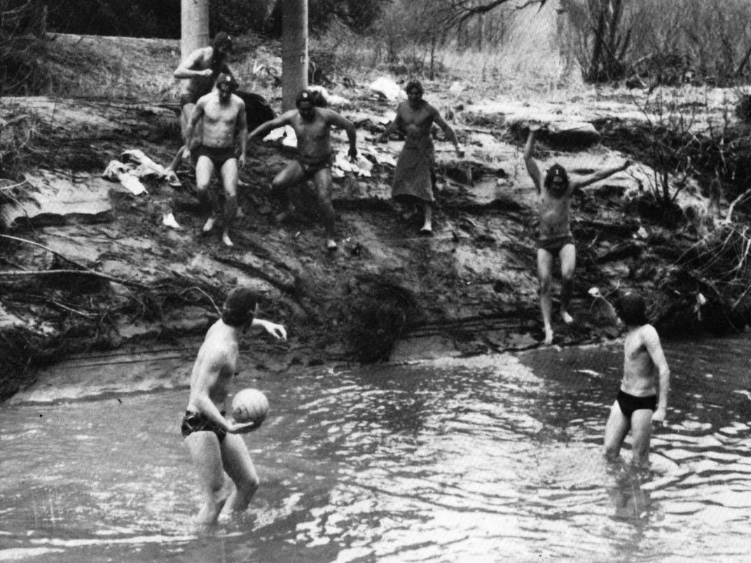 An old photo of people playing water polo.