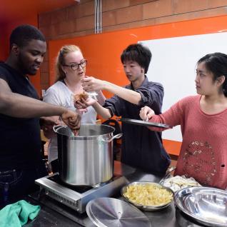 Students enrolled in the Edible History course recently ran a "pop-up" kitchen, serving up history lessons and curry dishes dating 400 years in the past.