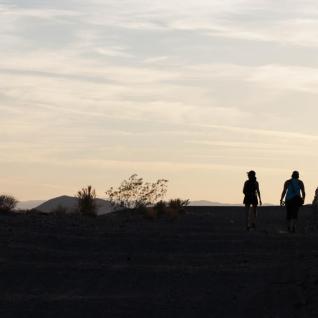 the students walking at sunset at sperry wash