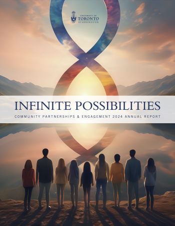Infinite Possibilities Annual Report Cover: A group of people stand on top of a peak, gazing upwards to the sky, looking at the sunset, with an iridescent infinity sign coming from the sky to the water at the bottom.