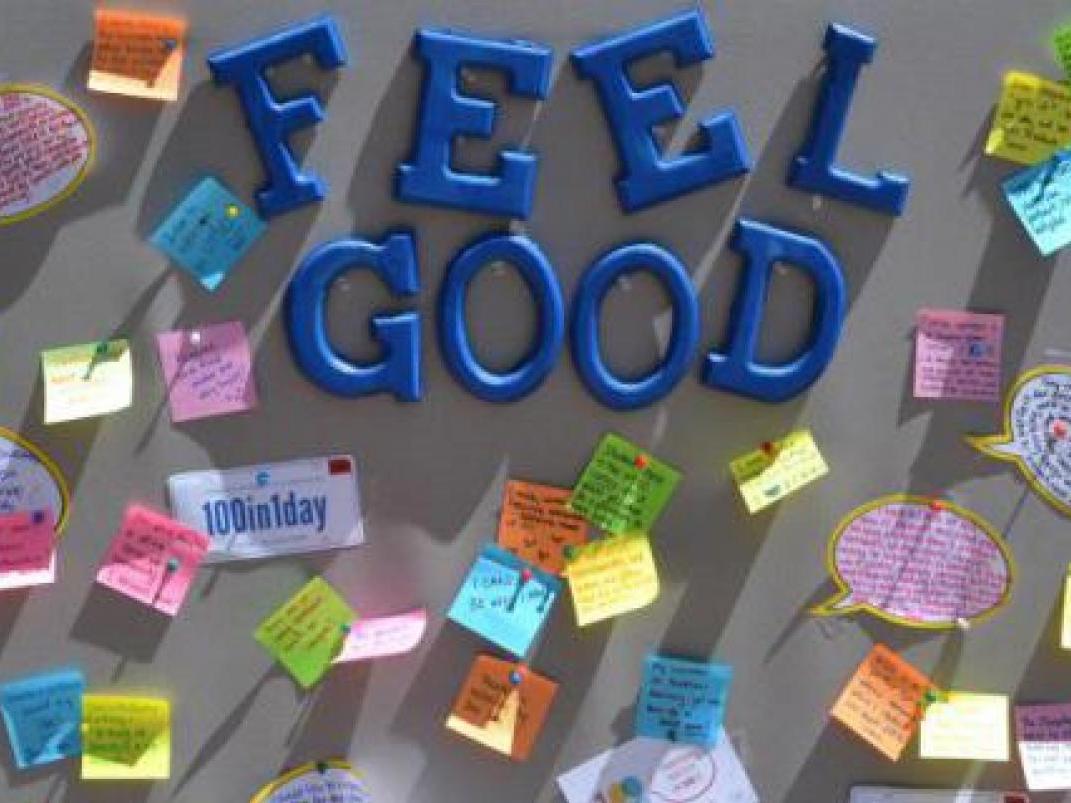 a picture of a bulletin board that has "Feel Good" on it along with post it notes 