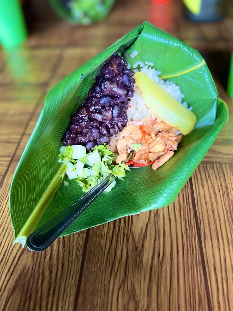 Traditional lunch in BriBri, served in the special palm leaf (chicken, rice, beans, chayote, and I’m not sure what the green leafy vegetable is called)